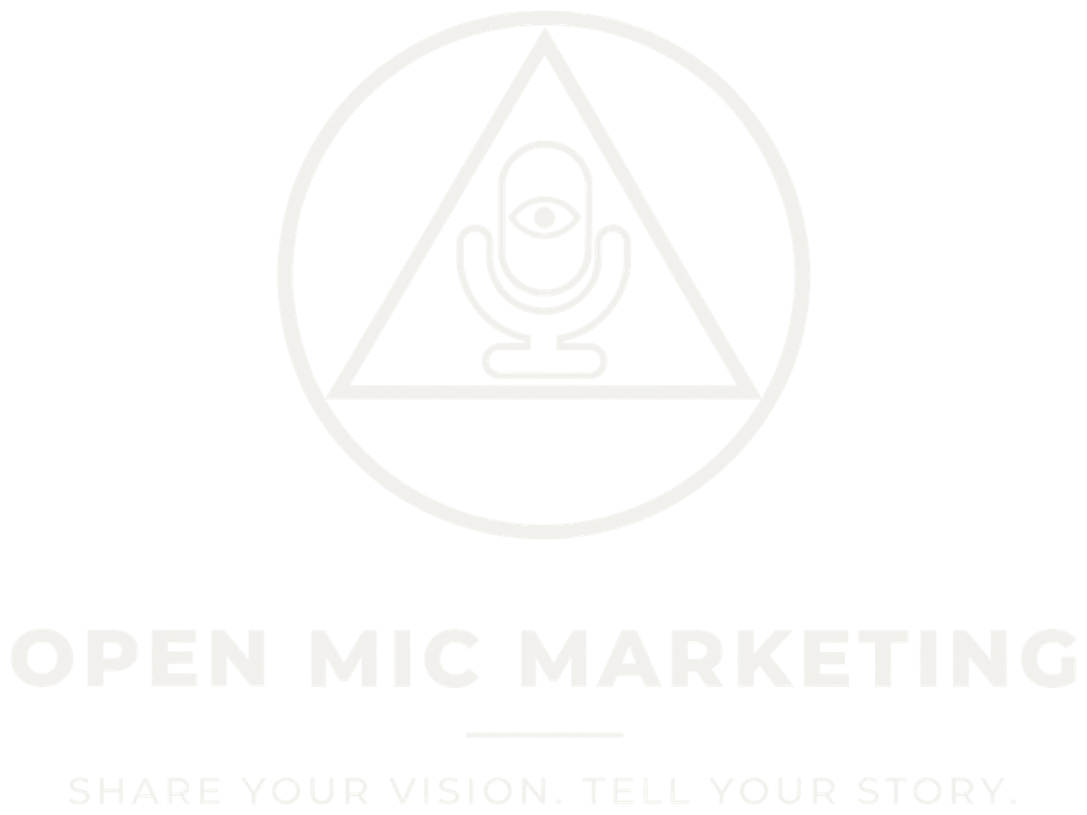 Open Mic Marketing logo: a microphone with an eye, inside a triangle within a circle. Share your vision. Tell your story.